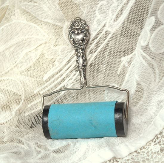 Picture of ANTIQUE VICTORIAN PRINT TOLLER WITH SILVER HANDLE