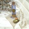 vintage glazen blauw gestreept parfumflesje