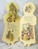 Antiek kinderboekje in de vorm van een pop