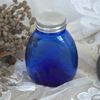 vintage blauw glazen flesje met  maat verdeling